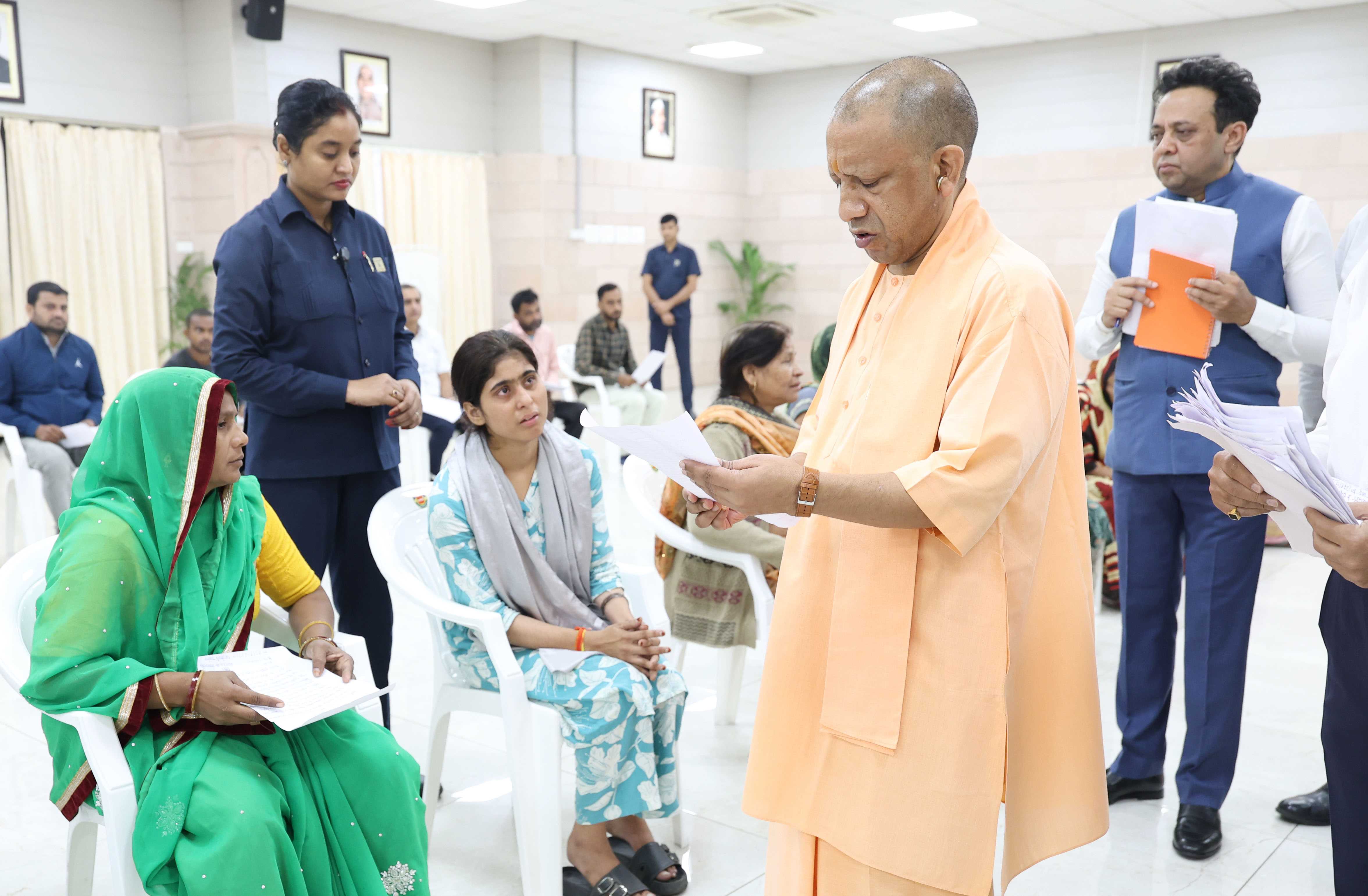 Hon'ble Chief Minister Yogi Adityanath ji listening to the problems of the people in Janta Darshan organized at his official residence 5- Kalidas Marg, Lucknow on October 13, 2025 and giving instructions to the concerned officials to resolve the public problems on priority basis.