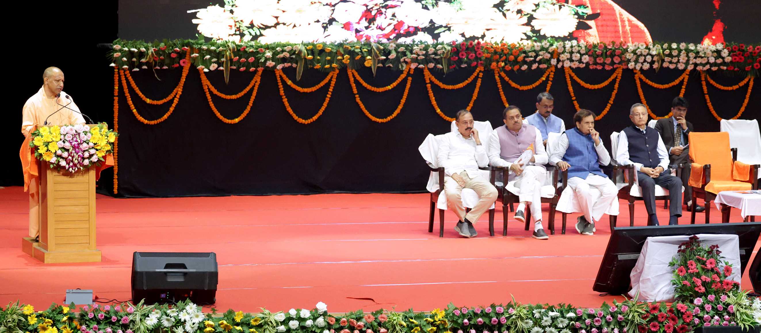Hon'ble Chief Minister Yogi Adityanath addressing the distribution of incentive sports material to Yuvak and Mahila Mangal Dals at Indira Gandhi Pratishthan, Gomtinagar, Lucknow on October 13, 2025.