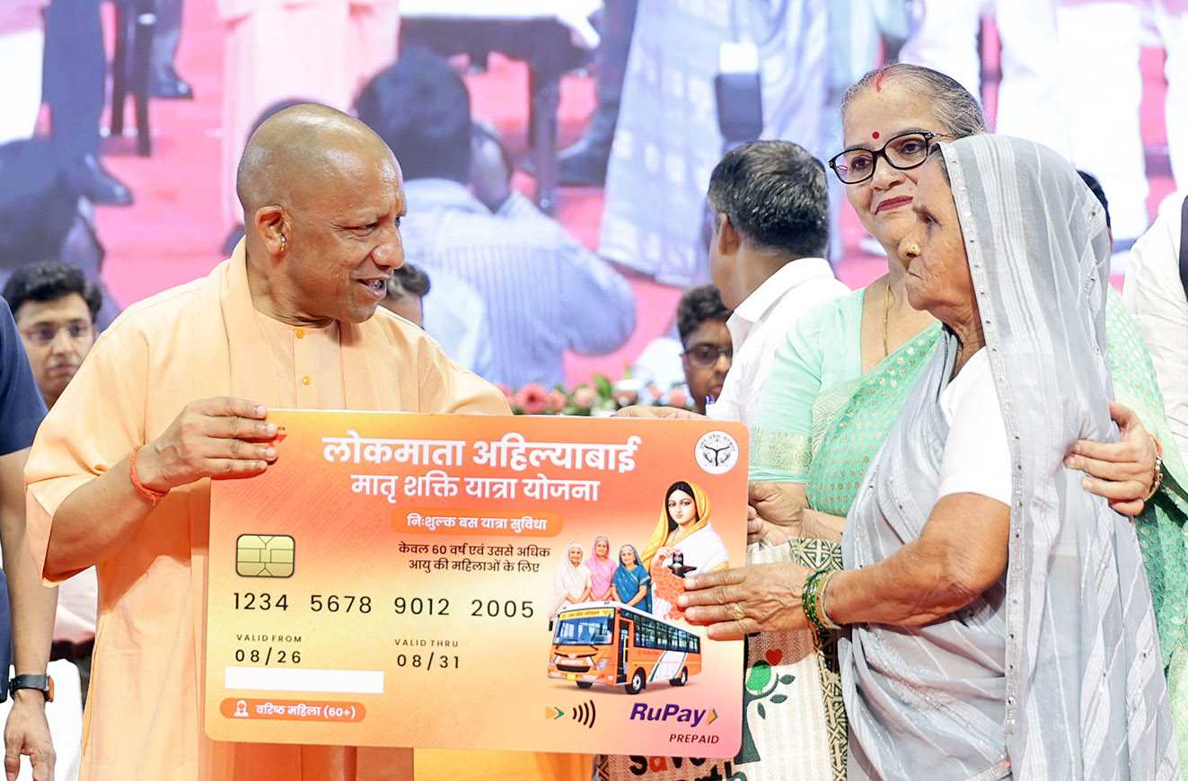 Hon'ble Chief Minister Yogi Adityanath Ji interacting with the beneficiaries of the 'Lokmata Ahilyabai Matrishakti Yatra' scheme, which provides free bus travel facility to women of Uttar Pradesh aged 60 years and above, at Indira Gandhi Pratishthan, Lucknow on August 26, 2026.